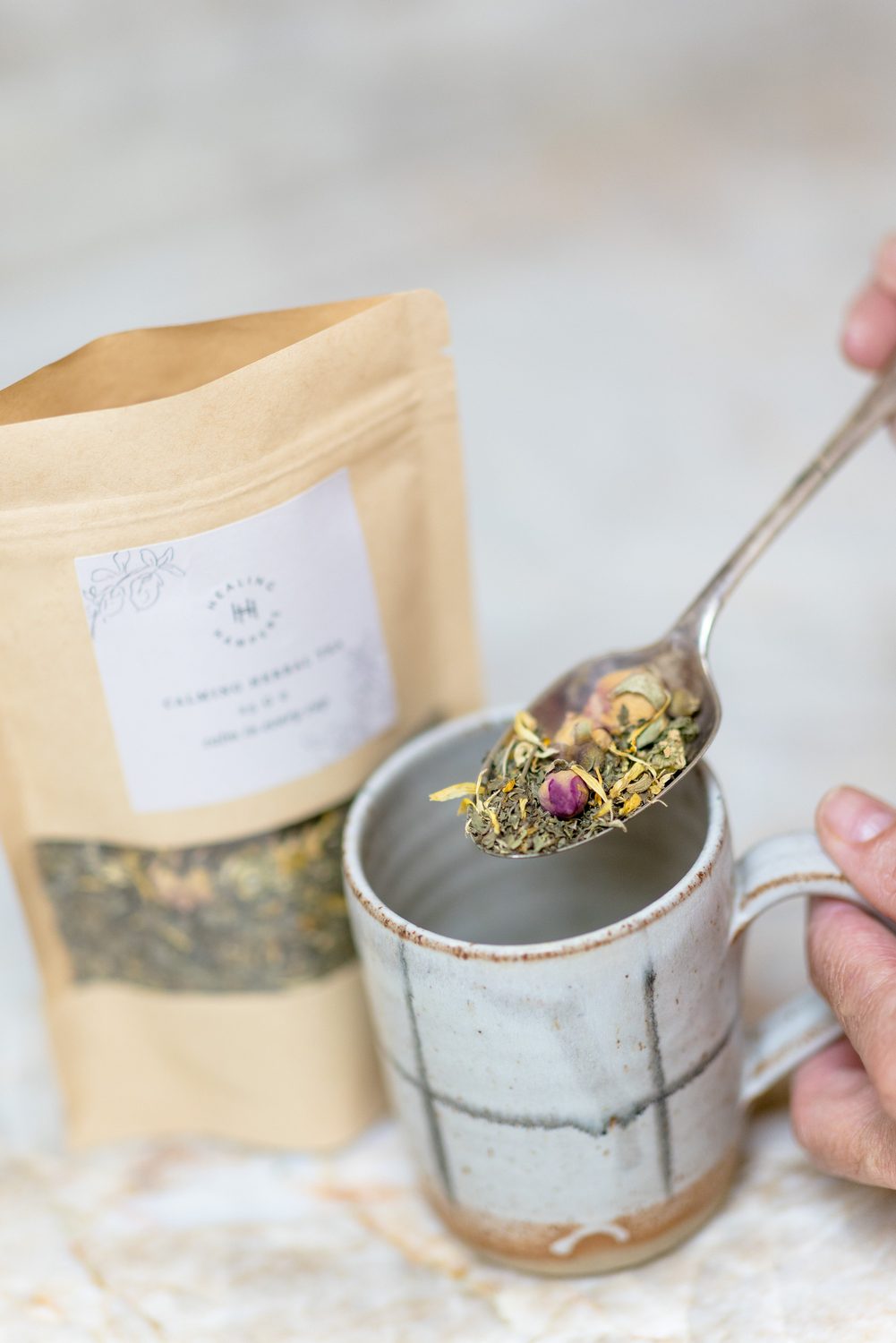 Healing Hampers calming herbal tea spooned into a handmade mug